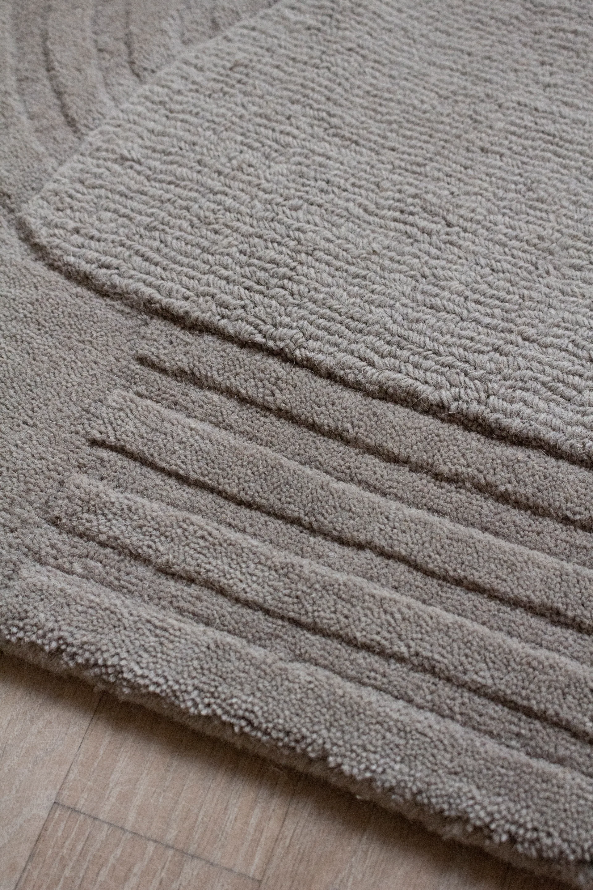 Circular ullmatta 180x270 cm, Light oatmeal Layered