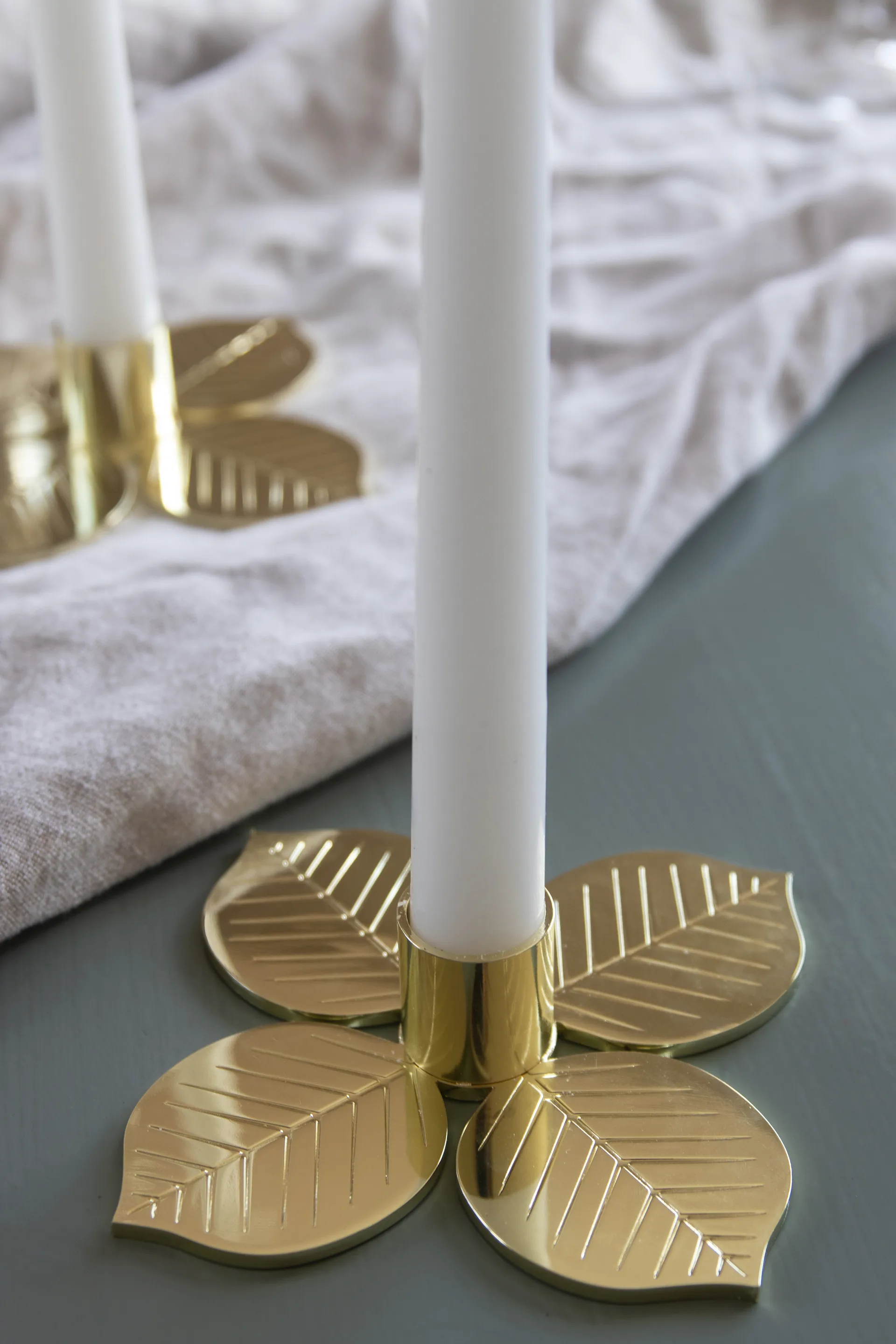 Stig L Berså ljusstake, Guld Pluto Design